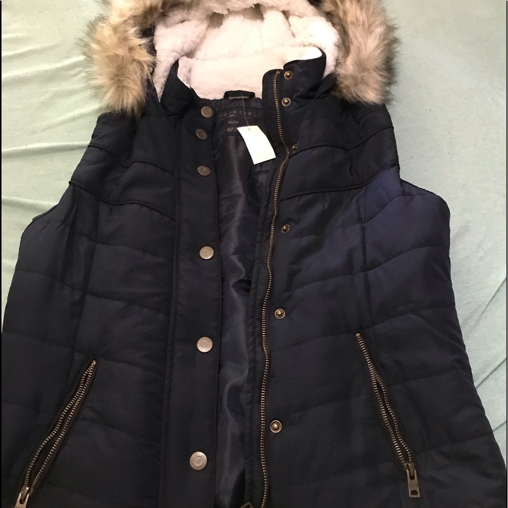 Navy vest with fur hood